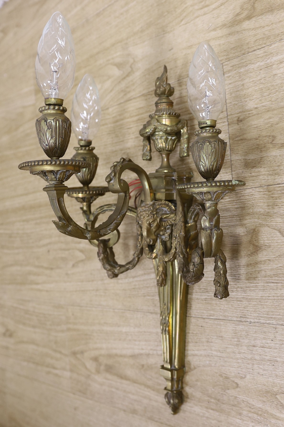 A Louis XVI style ormolu three branch wall light 55cm